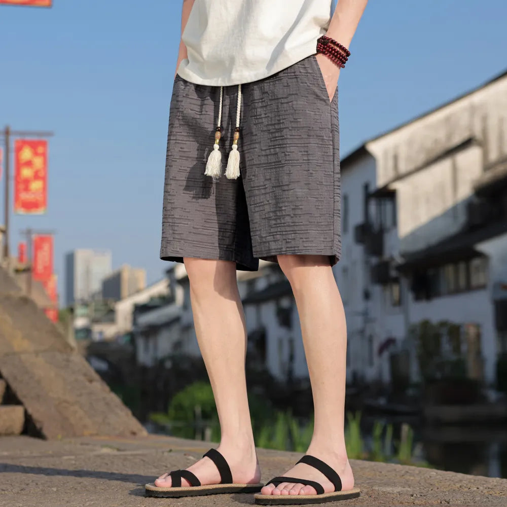 五分棉麻休閒褲版型細節，寬鬆褲腳設計提升夏日舒適活動感