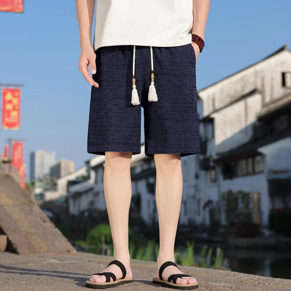 日系極簡棉麻短褲多色選擇，黑色適合男性日常搭配